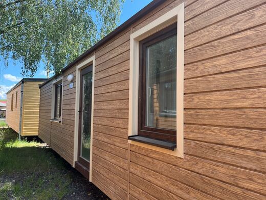 Mobilní dům s fasádou Decosiding Honey Oak